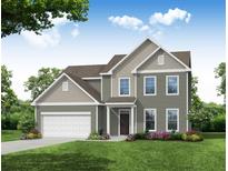 Two story house with gray siding, white garage door and landscaping at 119 Ashley Cove Way, Summerville, SC 29483