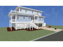 3 story light blue home with detached garage and deck at 7002 Ladson Jackson Ln, James Island, SC 29412