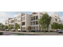 Modern townhouses with balconies and landscaping, located near a street at 618 Waterman St # 618, Charleston, SC 29492
