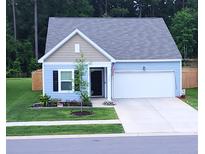Newly built light blue house with two-car garage at 4383 Ocean Farm Dr, Summerville, SC 29485