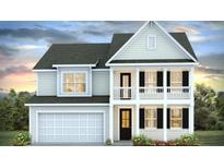 Two-story home with beige siding, black shutters, and a balcony at 340 Dickerson Ln, Summerville, SC 29485
