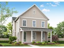 Two-story farmhouse-style home with covered porch at 180 Sandy Bend Ln, Summerville, SC 29486