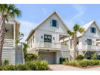 Charming white houses with garage and front yard at 3025 Southerly Way, Johns Island, SC 29455