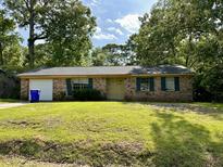 Brick ranch home with attached garage at 2106 Mission Ave, Charleston, SC 29414