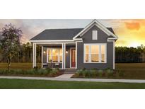 Craftsman style house with a gray exterior and welcoming porch at 411 Swaying Pine Lane, Summerville, SC 29486