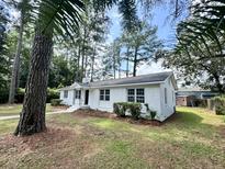 Newly renovated white brick ranch home with large yard at 201 Josie Dr, Walterboro, SC 29488