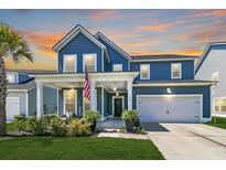 Beautiful two-story home with front porch at 120 Haverhill St, Summerville, SC 29486