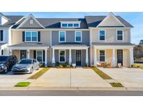 Townhouses with front porches and driveways at 205 Abercom Place Dr, Moncks Corner, SC 29461