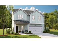 Two-story light green house with a white garage door and rocking chairs on the porch at 1020 Lovebug Ln, Summerville, SC 29485