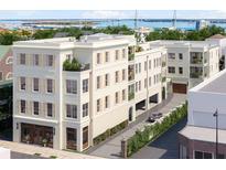 Luxury building with multiple units, parking, and ground-floor retail at 284 Meeting St # 301, Charleston, SC 29401
