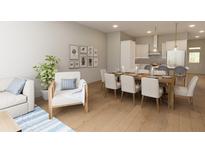 Bright dining area with large wooden table and seating for eight at 7421 Indigo Palms Way, Johns Island, SC 29455