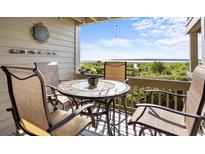 Enjoy water views from this relaxing deck, furnished with comfortable seating at 1351 Pelican Watch Villas, Seabrook Island, SC 29455