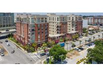 Brick building with multiple units and street-level retail at 150 Bee Street # 614, Charleston, SC 29401