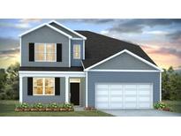 Two story home with gray siding and a two-car garage at 162 Carolina Groves Blvd, Moncks Corner, SC 29461