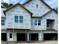New construction townhome building with two-car garages at 420 Carolina Cherry Ct # 204, Charleston, SC 29414