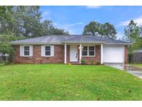 Brick ranch home with a white door and attached garage at 111 Duncan Ct, Summerville, SC 29486