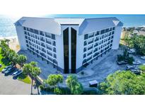 Oceanfront building with parking and a pool, offering stunning views at 9002 Palmetto Dr # 512, Isle of Palms, SC 29451