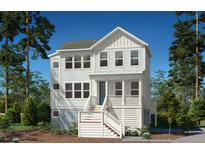 Two-story home with white siding and front porch at 1709 Vireo Ct, Johns Island, SC 29455