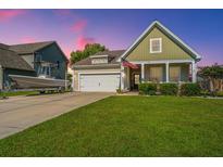 Charming house with boat and American flag at 513 Abigail St, Moncks Corner, SC 29461