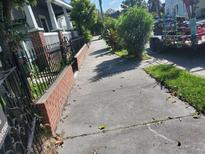 Sidewalk view showcasing a residential street scene at 8 Maverick St, Charleston, SC 29403