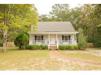 Charming one-story home with a porch at 309 Wintergreen Rd, Walterboro, SC 29488