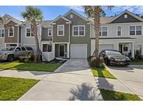 Townhouse exterior with two-car garage and landscaping at 175 Rosefield Ct, Summerville, SC 29485