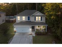 Aerial view of two-story home with attached garage at 314 Beverly Dr, Ladson, SC 29456