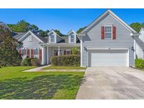 Gray siding two-story house with red shutters and attached garage at 399 Decatur Dr, Summerville, SC 29486