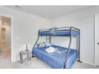 Bedroom with bunk beds and ample floor space at 229 Camellia Bloom Dr, Moncks Corner, SC 29461