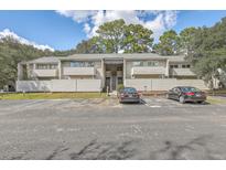 Two-story building with parking and landscaping at 202 Greenmeadow Dr, Goose Creek, SC 29445