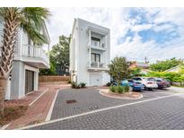 Modern three-story home with private parking and courtyard at 9 Iron Frg Aly, Charleston, SC 29403