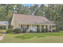 Ranch home with covered porch at 65 Gloverville Ln, Round O, SC 29474