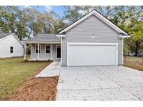 Gray house with a white garage door and small porch at 164 Aleene Drive Dr, Summerville, SC 29485