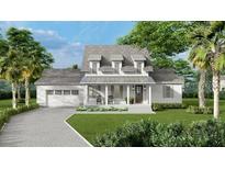 Two-story farmhouse with front porch, gray roof, and white siding at 5209 Seewee Rd, Awendaw, SC 29429