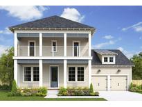 Two-story house with beige siding, gray trim, and a double-car garage at 1188 Reserve Ln, Awendaw, SC 29429