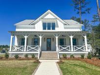 Charming two-story farmhouse with front porch at 3881 Summerton St, Mount Pleasant, SC 29466