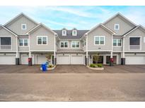 Three-unit townhome building with attached garages at 501 Raes Ct # 203, Charleston, SC 29414