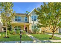 Charming two-story home with landscaped yard at 4966 Ballantine Drive, Summerville, SC 29485