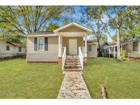 Charming bungalow with a front porch and steps at 2674 Houston St, North Charleston, SC 29405