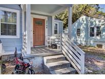 Inviting front porch with steps and classic design at 2748 E Surrey Dr, North Charleston, SC 29405