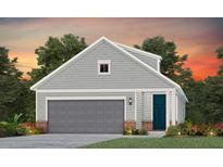 Gray siding, gray garage door, and teal front door at 746 Blue Iris Way, Summerville, SC 29486