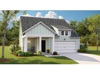 Charming one-story home with a front porch and two-car garage at 1018 Currant Rd, Summerville, SC 29485