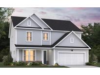 Two-story home with gray siding, white trim, and a two-car garage at 149 Winding Grove Ln, Moncks Corner, SC 29461