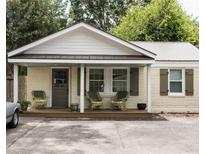 Charming renovated cottage with a welcoming front porch at 205 Scott St, Mount Pleasant, SC 29464
