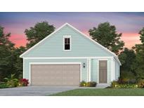 Charming one-story home with a light teal exterior, two-car garage, and landscaped front yard at 763 Blue Iris Way, Summerville, SC 29486