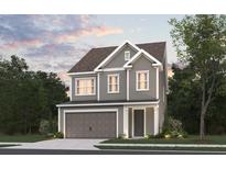 Two-story Craftsman style home with gray siding, brown roof, and a two-car garage at 4135 Collins Dr, Charleston, SC 29414