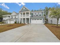 Two-story craftsman home with gray siding, white trim, and a two-car garage at 758 Maynard Ln, Summerville, SC 29486