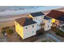 Beachfront home with multiple levels and ocean views at 108 Palmetto Blvd, Edisto Beach, SC 29438