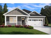 Gray farmhouse exterior with white trim, two-car garage, and covered porch at 319 Calm Water Way, Summerville, SC 29486