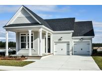 Two-car garage and front porch, light grey siding, and a dark grey roof at 346 Trailmore Ln, Summerville, SC 29486